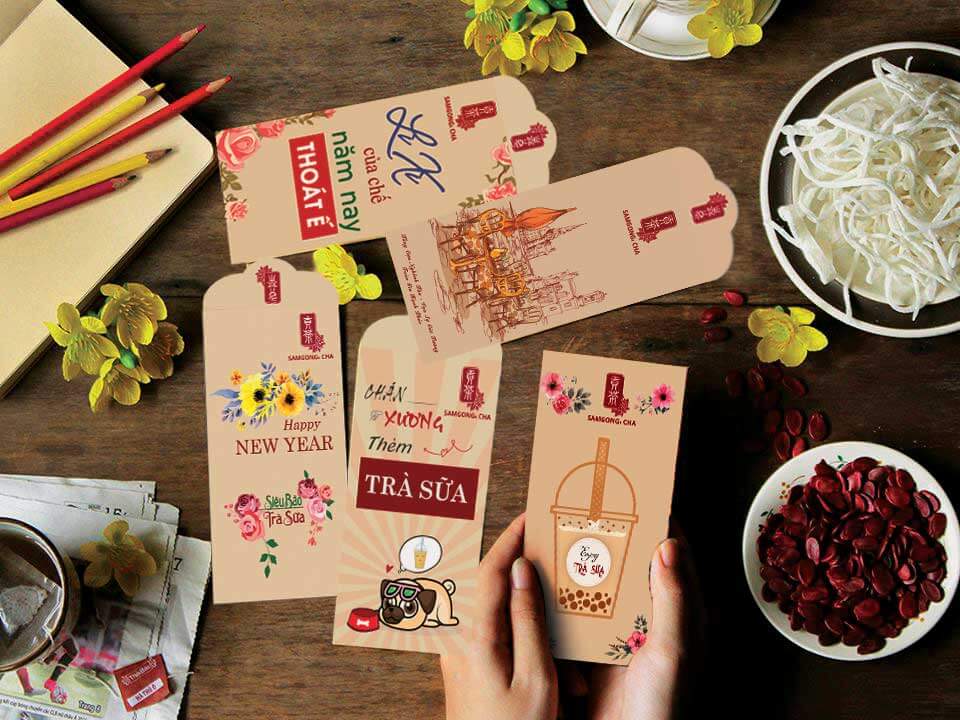 thiết kế bao lì xì cho quán trà sữa